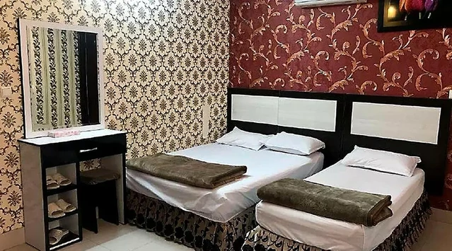 اتاق سه تخته هتل آپارتمان آیسان مشهد
