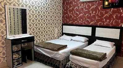 اتاق سه تخته هتل آپارتمان آیسان مشهد