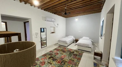 اتاق دو تخته تویین اقامتگاه بوم گردی غروب جزیره هنگام