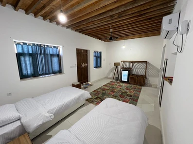 اتاق دو تخته تویین اقامتگاه بوم گردی غروب جزیره هنگام