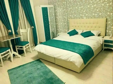 اتاق دو تخته دبل هتل سعدی مشهد با تم سبز