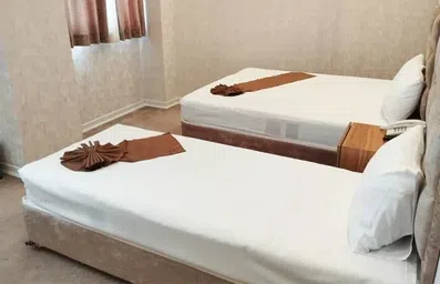 اتاق دوتخته تکی هتل شایگان ۲ مشهد